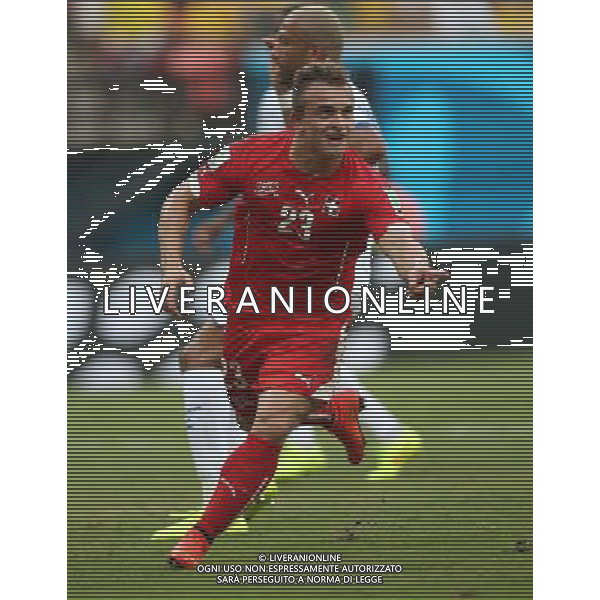(140625) -- MANAUS, June 25, 2014 () -- Switzerland\'s Xherdan Shaqiri (front) celebrates for his second goal during a Group E match between Honduras and Switzerland of 2014 FIFA World Cup at the Arena Amazonia Stadium in Manaus, Brazil, on June 25, 2014.(/Li Ming)(pcy) AG ALDO LIVERANI SAS ONLY ITALY