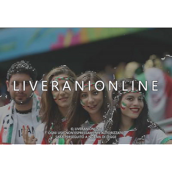 (140625) -- SALVADOR, June 25, 2014 () -- Iran\'s fans pose before a Group F match between Bosnia And Herzegovina and Iran of 2014 FIFA World Cup at the Arena Fonte Nova Stadium in Salvador, Brazil, June 24, 2014. (/Cao Can) AG ALDO LIVERANI SAS ONLY ITALY