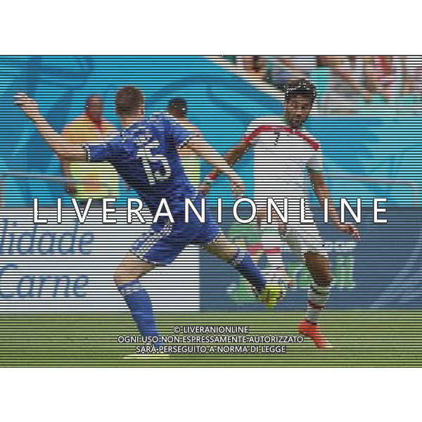 (140625) -- SALVADOR, June 25, 2014 () -- Bosnia And Herzegovina\'s Toni Sunjic vies with Iran\'s Masoud Shojaei during a Group F match between Bosnia And Herzegovina and Iran of 2014 FIFA World Cup at the Arena Fonte Nova Stadium in Salvador, Brazil, June 24, 2014. (/Cao Can) AG ALDO LIVERANI SAS ONLY ITALY