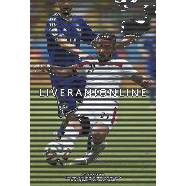 (140625) -- SALVADOR, June 25, 2014 () -- Iran\'s Ashkan Dejagah vies with Bosnia And Herzegovina\'s Tino Sven Susic during a Group F match between Bosnia And Herzegovina and Iran of 2014 FIFA World Cup at the Arena Fonte Nova Stadium in Salvador, Brazil, June 24, 2014. (/Yang Lei) AG ALDO LIVERANI SAS ONLY ITALY