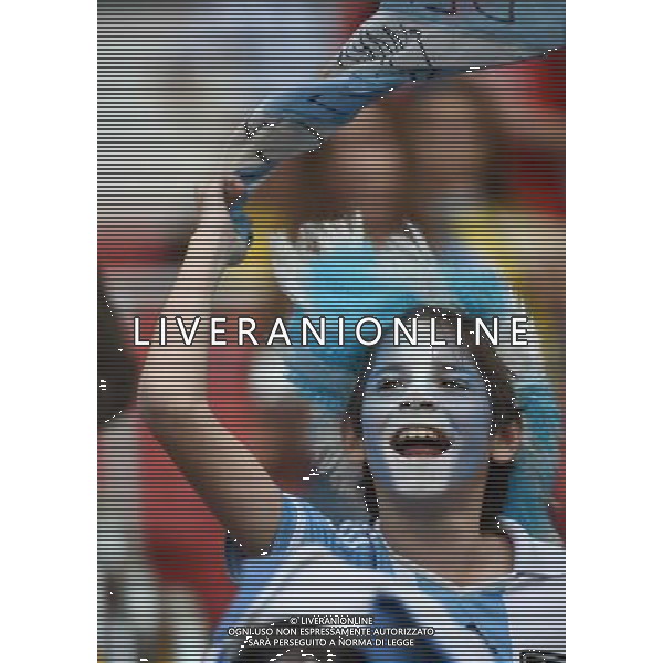 (140625) -- PORTO ALEGRE, June 25, 2014 () -- A young supporter of Argentina cheers before a Group F match between Nigeria and Argentina of 2014 FIFA World Cup at the Estadio Beira-Rio Stadium in Porto Alegre, Brazil, on June 25, 2014.(/Li Ga)(pcy) AG ALDO LIVERANI SAS ONLY ITALY