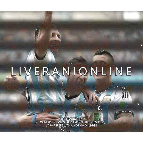 (140625) -- PORTO ALEGRE, June 25, 2014 () -- Argentina\'s Lionel Messi (L) celebrates for scoring a goal during a Group F match between Nigeria and Argentina of 2014 FIFA World Cup at the Estadio Beira-Rio Stadium in Porto Alegre, Brazil, on June 25, 2014.(/Li Ga)(pcy) AG ALDO LIVERANI SAS ONLY ITALY