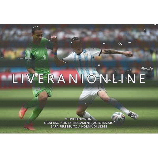 (140625) -- PORTO ALEGRE, June 25, 2014 () -- Argentina\'s Angel Di Maria (R) vies with Nigeria\'s Peter Osaze Odemwingie during a Group F match between Nigeria and Argentina of 2014 FIFA World Cup at the Estadio Beira-Rio Stadium in Porto Alegre, Brazil, on June 25, 2014.(/Li Ga)(pcy) AG ALDO LIVERANI SAS ONLY ITALY