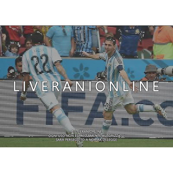 (140625) -- PORTO ALEGRE, June 25, 2014 () -- Argentina\'s Lionel Messi (R) celebrates for scoring his second goal during a Group F match between Nigeria and Argentina of 2014 FIFA World Cup at the Estadio Beira-Rio Stadium in Porto Alegre, Brazil, on June 25, 2014.(/Li Ga)(pcy) AG ALDO LIVERANI SAS ONLY ITALY