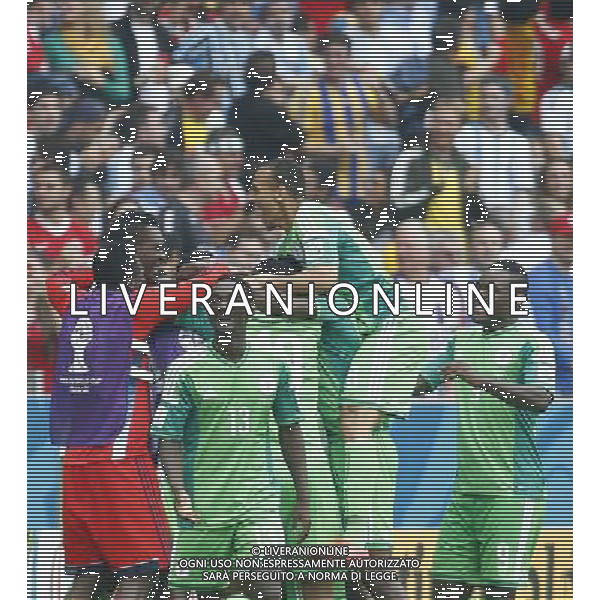 (140625) -- PORTO ALEGRE, June 25, 2014 () -- Nigeria\'s players celebrate for Ahmed Musa\'s second goal during a Group F match between Nigeria and Argentina of 2014 FIFA World Cup at the Estadio Beira-Rio Stadium in Porto Alegre, Brazil, on June 25, 2014.(/Chen Jianli)(pcy) AG ALDO LIVERANI SAS ONLY ITALY