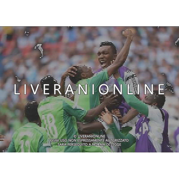 (140625) -- PORTO ALEGRE, June 25, 2014 () -- Nigeria\'s Ahmed Musa (C) celebrates with his teammates for scoring his second goal during a Group F match between Nigeria and Argentina of 2014 FIFA World Cup at the Estadio Beira-Rio Stadium in Porto Alegre, Brazil, on June 25, 2014.(/Li Ga)(pcy) AG ALDO LIVERANI SAS ONLY ITALY