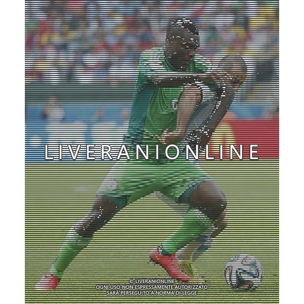 (140625) -- PORTO ALEGRE, June 25, 2014 () -- Nigeria\'s Emmanuel Emenike (L) vies with Argentina\'s Javier Mascherano during a Group F match between Nigeria and Argentina of 2014 FIFA World Cup at the Estadio Beira-Rio Stadium in Porto Alegre, Brazil, on June 25, 2014.(/Chen Jianli)(pcy) AG ALDO LIVERANI SAS ONLY ITALY