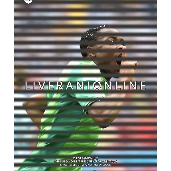(140625) -- PORTO ALEGRE, June 25, 2014 () -- Nigeria\'s Ahmed Musa celebrates for scoring his second goal during a Group F match between Nigeria and Argentina of 2014 FIFA World Cup at the Estadio Beira-Rio Stadium in Porto Alegre, Brazil, on June 25, 2014.(/Li Ga)(pcy) AG ALDO LIVERANI SAS ONLY ITALY