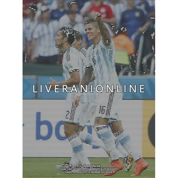 (140625) -- PORTO ALEGRE, June 25, 2014 () -- Argentina\'s Marcos Rojo (front) celebrates for scoring a goal during a Group F match between Nigeria and Argentina of 2014 FIFA World Cup at the Estadio Beira-Rio Stadium in Porto Alegre, Brazil, on June 25, 2014.(/Chen Jianli)(pcy) AG ALDO LIVERANI SAS ONLY ITALY