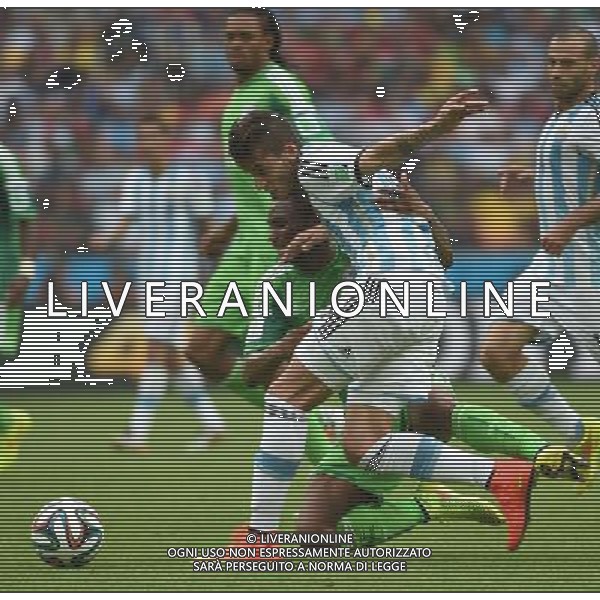 (140625) -- PORTO ALEGRE, June 25, 2014 () -- Argentina\'s Ricardo Alvarez (front) competes during a Group F match between Nigeria and Argentina of 2014 FIFA World Cup at the Estadio Beira-Rio Stadium in Porto Alegre, Brazil, on June 25, 2014.(/Li Ga)(pcy) AG ALDO LIVERANI SAS ONLY ITALY