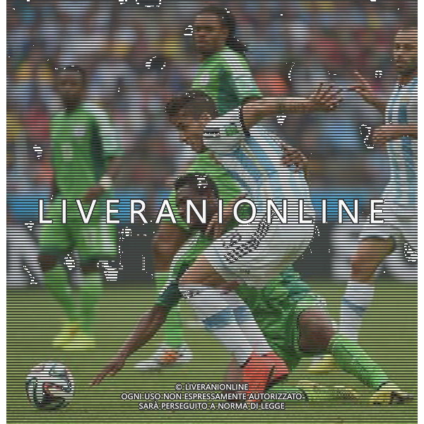 (140625) -- PORTO ALEGRE, June 25, 2014 () -- Argentina\'s Ricardo Alvarez (front) competes during a Group F match between Nigeria and Argentina of 2014 FIFA World Cup at the Estadio Beira-Rio Stadium in Porto Alegre, Brazil, on June 25, 2014.(/Li Ga)(pcy) AG ALDO LIVERANI SAS ONLY ITALY
