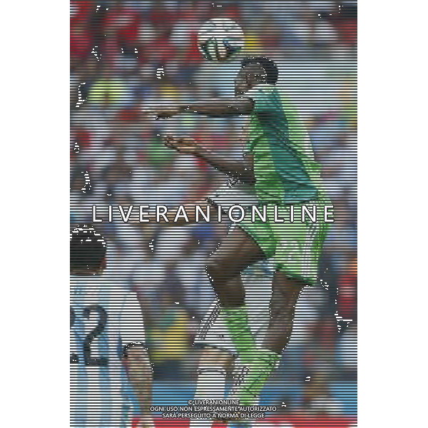 (140625) -- PORTO ALEGRE, June 25, 2014 () -- Nigeria\'s Kenneth Omeruo (front) heads the ball during a Group F match between Nigeria and Argentina of 2014 FIFA World Cup at the Estadio Beira-Rio Stadium in Porto Alegre, Brazil, on June 25, 2014. Argentina won 3-2 over Nigeria on Wednesday. (/Chen Jianli)(pcy) AG ALDO LIVERANI SAS ONLY ITALY
