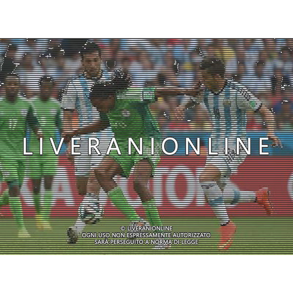 (140625) -- PORTO ALEGRE, June 25, 2014 () -- Nigeria\'s Michael Uchebo (C, front) competes during a Group F match between Nigeria and Argentina of 2014 FIFA World Cup at the Estadio Beira-Rio Stadium in Porto Alegre, Brazil, on June 25, 2014.(/Li Ga)(pcy) AG ALDO LIVERANI SAS ONLY ITALY