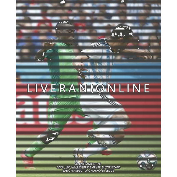 (140625) -- PORTO ALEGRE, June 25, 2014 () -- Nigeria\'s Emmanuel Emenike (L) competes during a Group F match between Nigeria and Argentina of 2014 FIFA World Cup at the Estadio Beira-Rio Stadium in Porto Alegre, Brazil, on June 25, 2014. Argentina won 3-2 over Nigeria on Wednesday. (/Chen Jianli)(pcy) AG ALDO LIVERANI SAS ONLY ITALY