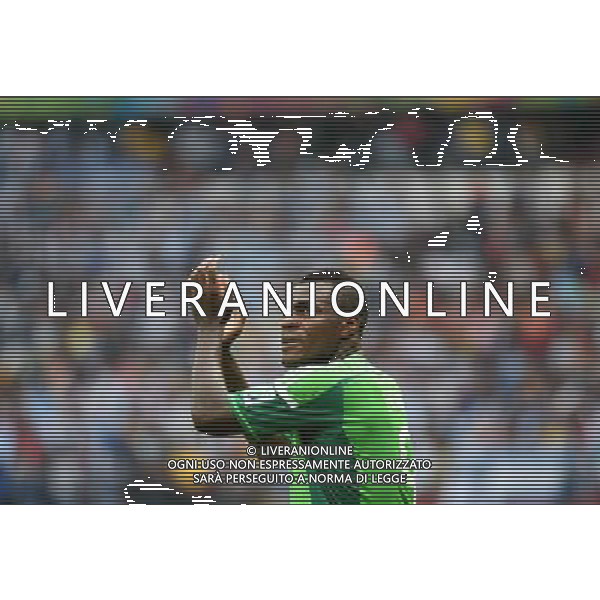 (140625) -- PORTO ALEGRE, June 25, 2014 () -- Nigeria\'s Emmanuel Emenike applauds the audience during a Group F match between Nigeria and Argentina of 2014 FIFA World Cup at the Estadio Beira-Rio Stadium in Porto Alegre, Brazil, on June 25, 2014. Argentina won 3-2 over Nigeria on Wednesday. (/Li Ga)(pcy) AG ALDO LIVERANI SAS ONLY ITALY