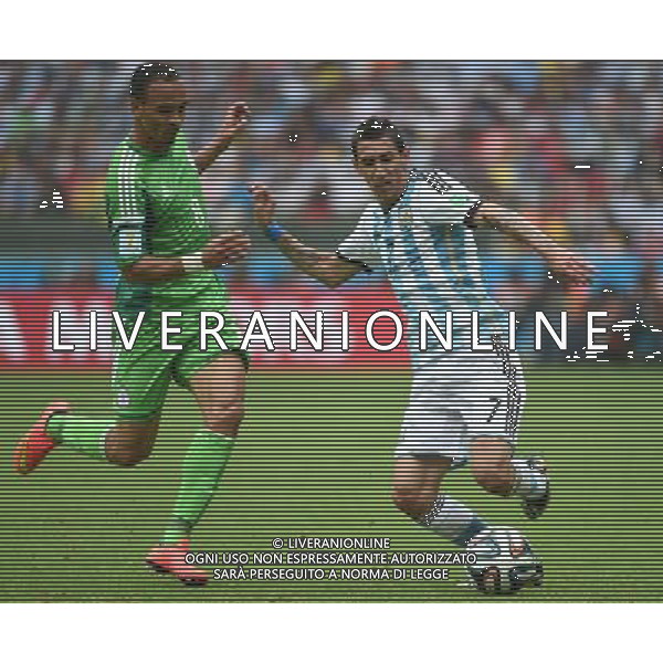 (140625) -- PORTO ALEGRE, June 25, 2014 () -- Argentina\'s Angel Di Maria (R) vies with Nigeria\'s Peter Osaze Odemwingie during a Group F match between Nigeria and Argentina of 2014 FIFA World Cup at the Estadio Beira-Rio Stadium in Porto Alegre, Brazil, on June 25, 2014. Argentina won 3-2 over Nigeria on Wednesday. (/Li Ga)(pcy) AG ALDO LIVERANI SAS ONLY ITALY