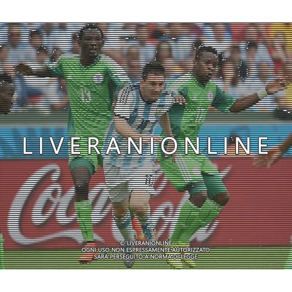 (140625) -- PORTO ALEGRE, June 25, 2014 () -- Argentina\'s Lionel Messi (C) breaks through during a Group F match between Nigeria and Argentina of 2014 FIFA World Cup at the Estadio Beira-Rio Stadium in Porto Alegre, Brazil, on June 25, 2014. Argentina won 3-2 over Nigeria on Wednesday. (/Li Ga)(pcy) AG ALDO LIVERANI SAS ONLY ITALY