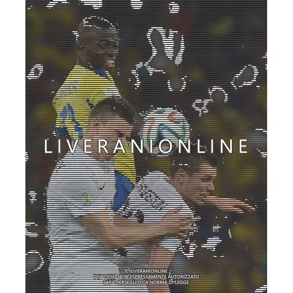 (140625) -- RIO DE JANEIRO, June 25, 2014 () -- Ecuador\'s Enner Valencia (C) jumps for the ball during a Group E match between Ecuador and France of 2014 FIFA World Cup at the Estadio do Maracana Stadium in Rio de Janeiro, Brazil, June 25, 2014. The match ended in a 0-0 draw. (/Wang Yuguo) AG ALDO LIVERANI SAS ONLY ITALY