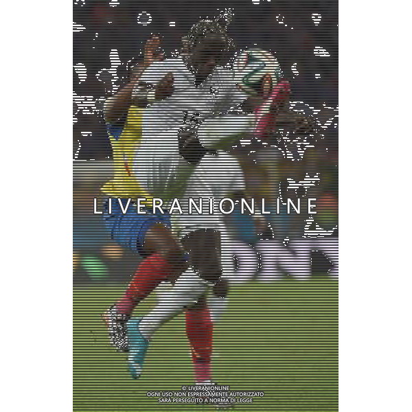 (140625) -- RIO DE JANEIRO, June 25, 2014 () -- France\'s Bacary Sagna controls the ball during a Group E match between Ecuador and France of 2014 FIFA World Cup at the Estadio do Maracana Stadium in Rio de Janeiro, Brazil, June 25, 2014. (/Wang Yuguo) AG ALDO LIVERANI SAS ONLY ITALY