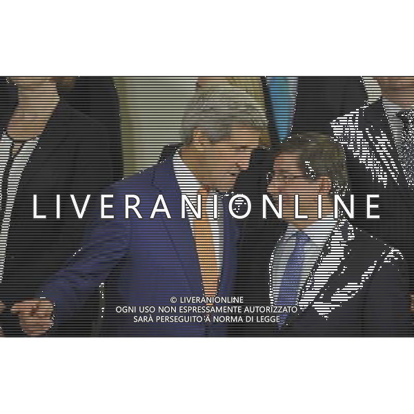 (140625) -- BRUSSELS, June 25, 2014 () -- US Secretary of State John Kerry (L) talks with Turkish Foreign Minister Ahmet Davutoglu during the family photo session of NATO Foreign Ministers Meetings at its headquarters in Brussels, capital of Brussels, June 25, 2014. (/Ye Pingfan) ©PHOTOSHOT/Agenzia Aldo Liverani sas - ITALY ONLY - EDITORIAL USE ONLY - Riunione dei Ministri degli esteri della NATO presso la sede di Bruxelles, Belgio 25 giugno 2014