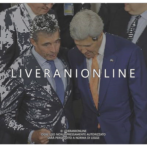 (140625) -- BRUSSELS, June 25, 2014 () -- NATO Secretary and General Anders Fogh Rasmussen (L) and US Secretary of State John Kerry talk after the family photo session of NATO Foreign Ministers Meetings at its headquarters in Brussels, capital of Brussels, June 25, 2014. (/Ye Pingfan) ©PHOTOSHOT/Agenzia Aldo Liverani sas - ITALY ONLY - EDITORIAL USE ONLY - Riunione dei Ministri degli esteri della NATO presso la sede di Bruxelles, Belgio 25 giugno 2014