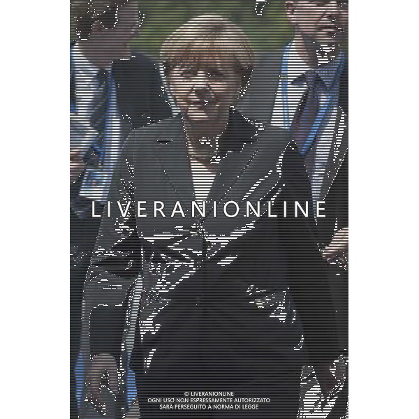 German Federal Chancellor Angela Merkel arrives at the European People\'s Party (EPP) Summit ahead of the European Council in Kortijk, Belgium on 26.06.2014 The main topic of the meeting will be the negotiation for the next presidency of the European Commission. by Wiktor Dabkowski ©PHOTOHOT/Agenzia Aldo Liverani sas - ITALY ONLY - EDITORIAL USE ONLY