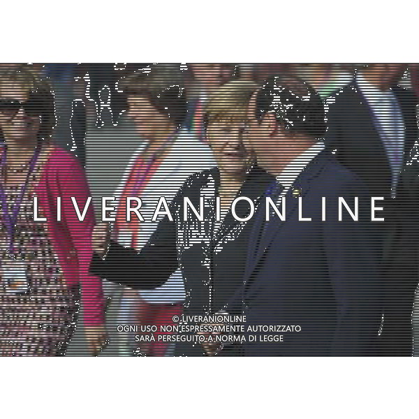 (140626) -- BRUSSELS, June 26, 2014 () -- German Chancellor Angela Merkel (L) talks with French President Francois Hollande after a ceremony marking the centenary of the outbreak of World War I, in Ypres, northwest of Belgium, on June 26, 2014. During the war, hundreds of thousands of soldiers and civilians from all over the world lost their lives around the Belgian town of Ypres. EU leaders begin a two-day summit here, one of the World War I\'s deadliest battlefields, on Thursday. (/Ye Pingfan) ©PHOTOHOT/Agenzia Aldo Liverani sas - ITALY ONLY - EDITORIAL USE ONLY