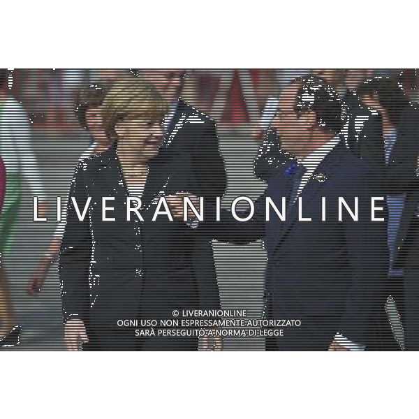 (140626) -- BRUSSELS, June 26, 2014 () -- German Chancellor Angela Merkel (L) talks with French President Francois Hollande after a ceremony marking the centenary of the outbreak of World War I, in Ypres, northwest of Belgium, on June 26, 2014. During the war, hundreds of thousands of soldiers and civilians from all over the world lost their lives around the Belgian town of Ypres. EU leaders begin a two-day summit here, one of the World War I\'s deadliest battlefields, on Thursday. (/Ye Pingfan) ©PHOTOHOT/Agenzia Aldo Liverani sas - ITALY ONLY - EDITORIAL USE ONLY