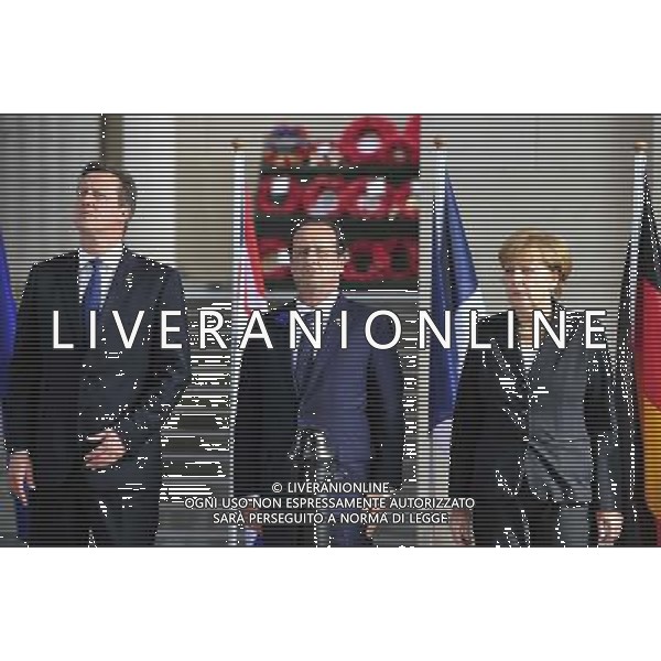 (140626) -- BRUSSELS, June 26, 2014 () -- British Prime Minister David Cameron, French President Francois Hollande, German Chancellor Angela Merkel (from L to R) attend a ceremony marking the centenary of the outbreak of World War I, in Ypres, northwest of Belgium, on June 26, 2014. During the war, hundreds of thousands of soldiers and civilians from all over the world lost their lives around the Belgian town of Ypres. EU leaders begin a two-day summit here, one of the World War I\'s deadliest battlefields, on Thursday. (/Ye Pingfan) ©PHOTOHOT/Agenzia Aldo Liverani sas - ITALY ONLY - EDITORIAL USE ONLY