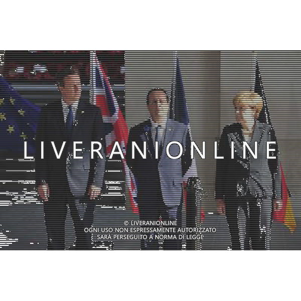 (140626) -- BRUSSELS, June 26, 2014 () -- British Prime Minister David Cameron, French President Francois Hollande, German Chancellor Angela Merkel (from L to R) attend a ceremony marking the centenary of the outbreak of World War I, in Ypres, northwest of Belgium, on June 26, 2014. During the war, hundreds of thousands of soldiers and civilians from all over the world lost their lives around the Belgian town of Ypres. EU leaders begin a two-day summit here, one of the World War I\'s deadliest battlefields, on Thursday. (/Ye Pingfan) ©PHOTOHOT/Agenzia Aldo Liverani sas - ITALY ONLY - EDITORIAL USE ONLY