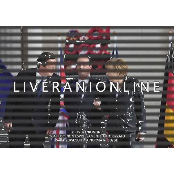 (140626) -- BRUSSELS, June 26, 2014 () -- British Prime Minister David Cameron, French President Francois Hollande, German Chancellor Angela Merkel (from L to R) attend a ceremony marking the centenary of the outbreak of World War I, in Ypres, northwest of Belgium, on June 26, 2014. During the war, hundreds of thousands of soldiers and civilians from all over the world lost their lives around the Belgian town of Ypres. EU leaders begin a two-day summit here, one of the World War I\'s deadliest battlefields, on Thursday. (/Ye Pingfan) ©PHOTOHOT/Agenzia Aldo Liverani sas - ITALY ONLY - EDITORIAL USE ONLY
