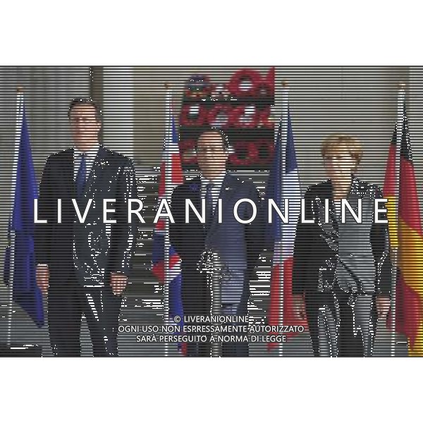 (140626) -- BRUSSELS, June 26, 2014 () -- British Prime Minister David Cameron, French President Francois Hollande, German Chancellor Angela Merkel (from L to R) attend a ceremony marking the centenary of the outbreak of World War I, in Ypres, northwest of Belgium, on June 26, 2014. During the war, hundreds of thousands of soldiers and civilians from all over the world lost their lives around the Belgian town of Ypres. EU leaders begin a two-day summit here, one of the World War I\'s deadliest battlefields, on Thursday. (/Ye Pingfan) ©PHOTOHOT/Agenzia Aldo Liverani sas - ITALY ONLY - EDITORIAL USE ONLY