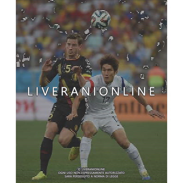 (140626) -- SAO PAULO, June 26, 2014 () -- South Korea\'s Lee Yong (R) vies with Belgium\'s Jan Vertonghen during a Group H match between South Korea and Belgium of 2014 FIFA World Cup at the Arena de Sao Paulo Stadium in Sao Paulo, Brazil, on June 26, 2014. (/Li Ga)(xzj) ©PHOTOHOT/Agenzia Aldo Liverani sas - ITALY ONLY - EDITORIAL USE ONLY
