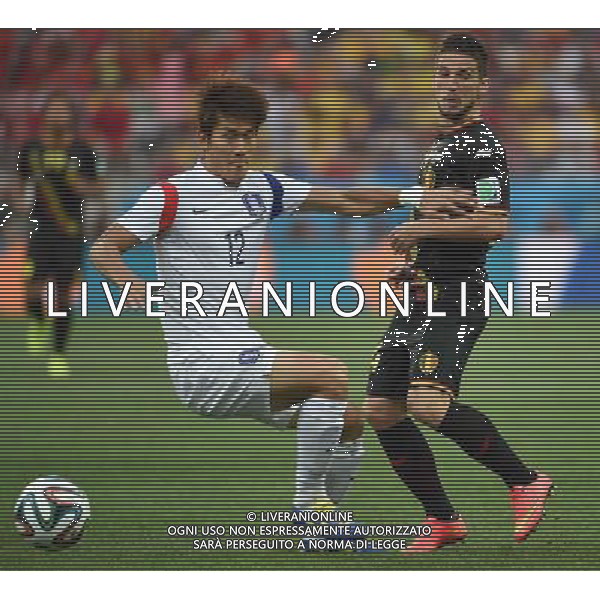 (140626) -- SAO PAULO, June 26, 2014 () -- South Korea\'s Lee Yong (L) competes during a Group H match between South Korea and Belgium of 2014 FIFA World Cup at the Arena de Sao Paulo Stadium in Sao Paulo, Brazil, on June 26, 2014. (/Li Ga)(xzj) ©PHOTOHOT/Agenzia Aldo Liverani sas - ITALY ONLY - EDITORIAL USE ONLY