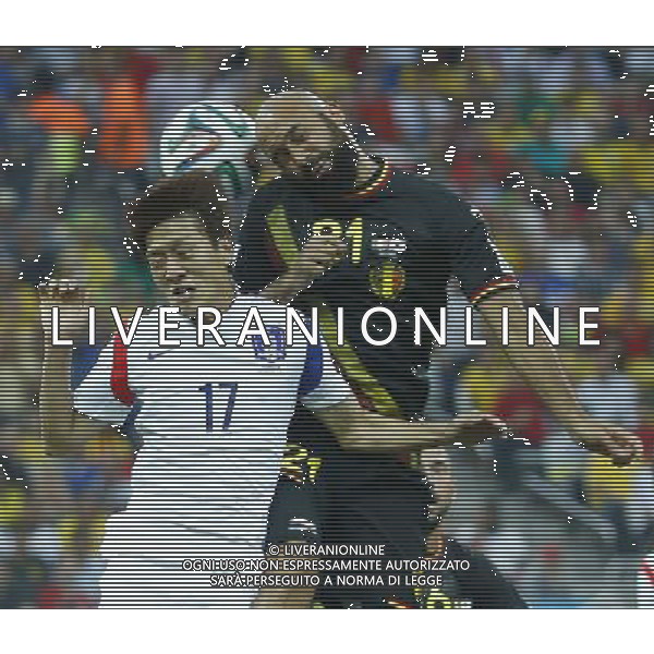 (140626) -- SAO PAULO, June 26, 2014 () -- Belgium\'s Vanden Borr (R) vies with South Korea\'s Lee Chung Yong during a Group H match between South Korea and Belgium of 2014 FIFA World Cup at the Arena de Sao Paulo Stadium in Sao Paulo, Brazil, on June 26, 2014. (/Chen Jianli)(xzj) ©PHOTOHOT/Agenzia Aldo Liverani sas - ITALY ONLY - EDITORIAL USE ONLY