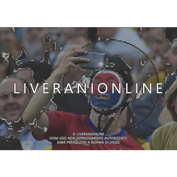 (140626) -- SAO PAULO, June 26, 2014 () -- A Korea Republic\'s fan takes photo during a Group H match between Korea Republic and Belgium of 2014 FIFA World Cup at the Arena de Sao Paulo Stadium in Sao Paulo, Brazil, on June 26, 2014. (/Li Ga)(xzj) ©PHOTOHOT/Agenzia Aldo Liverani sas - ITALY ONLY - EDITORIAL USE ONLY