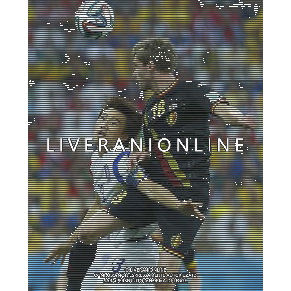 (140626) -- SAO PAULO, June 26, 2014 () -- Belgium\'s Nicolas Lombaerts (R) competes for a header with Korea Republic\'s Lee Bum Young during a Group H match between Korea Republic and Belgium of 2014 FIFA World Cup at the Arena de Sao Paulo Stadium in Sao Paulo, Brazil, on June 26, 2014. (/Chen Jianli)(xzj) ©PHOTOHOT/Agenzia Aldo Liverani sas - ITALY ONLY - EDITORIAL USE ONLY
