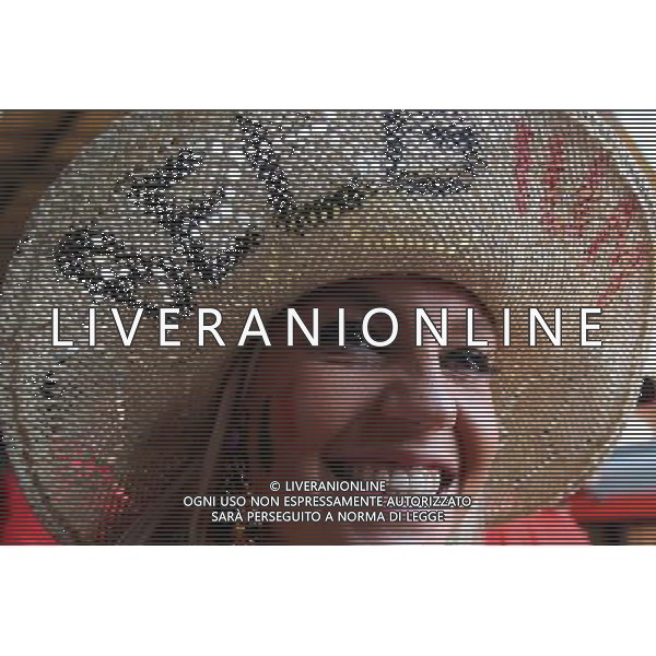 (140626) -- SAO PAULO, June 26, 2014 () -- A supporter of Belgium is seen as she waits for a train to the Arena Sao Paulo Stadium where a Group H match between Belgium and Korea Republic of 2014 FIFA World Cup is held, in Sao Paulo, Brazil, June 26, 2014.(/Rahel Patrasso)(pcy) ©PHOTOHOT/Agenzia Aldo Liverani sas - ITALY ONLY - EDITORIAL USE ONLY