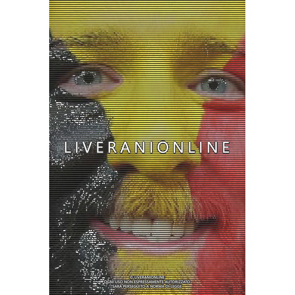 (140626) -- SAO PAULO, June 26, 2014 () -- A supporter of Belgium is seen as he waits for a train to the Arena Sao Paulo Stadium where a Group H match between Belgium and Korea Republic of 2014 FIFA World Cup is held, in Sao Paulo, Brazil, June 26, 2014.(/Rahel Patrasso)(pcy) ©PHOTOHOT/Agenzia Aldo Liverani sas - ITALY ONLY - EDITORIAL USE ONLY