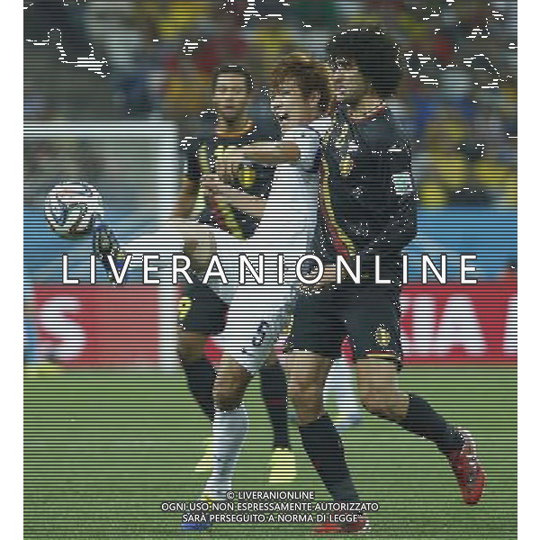 (140626) -- SAO PAULO, June 26, 2014 () -- Belgium\'s Marouane Fellaini (R) vies with Korea Republic\'s Kim Young Gwon during a Group H match between Korea Republic and Belgium of 2014 FIFA World Cup at the Arena de Sao Paulo Stadium in Sao Paulo, Brazil, on June 26, 2014. (/Chen Jianli)(xzj) ©PHOTOHOT/Agenzia Aldo Liverani sas - ITALY ONLY - EDITORIAL USE ONLY