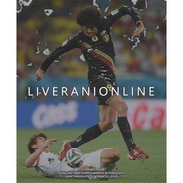 (140626) -- SAO PAULO, June 26, 2014 () -- Korea Republic\'s Koo Ja Cheol competes with Belgium\'s Marouane Fellaini during a Group H match between Korea Republic and Belgium of 2014 FIFA World Cup at the Arena de Sao Paulo Stadium in Sao Paulo, Brazil, on June 26, 2014. (/Li Ga)(xzj) ©PHOTOHOT/Agenzia Aldo Liverani sas - ITALY ONLY - EDITORIAL USE ONLY