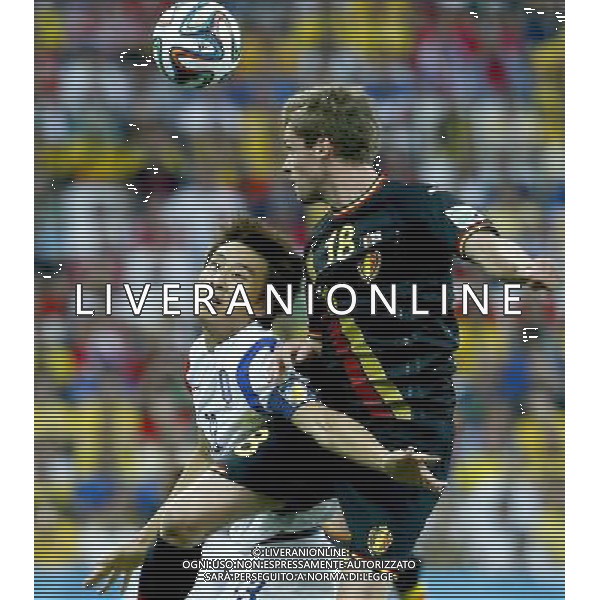 (140626) -- SAO PAULO, June 26, 2014 () -- Belgium\'s Nicolas Lombaerts (R) competes for a header with Korea Republic\'s Koo Ja Cheol during a Group H match between Korea Republic and Belgium of 2014 FIFA World Cup at the Arena de Sao Paulo Stadium in Sao Paulo, Brazil, on June 26, 2014. (/Chen Jianli)(xzj) ©PHOTOHOT/Agenzia Aldo Liverani sas - ITALY ONLY - EDITORIAL USE ONLY