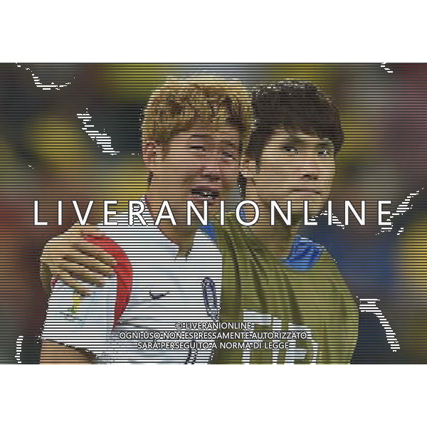 (140626) -- SAO PAULO, June 26, 2014 () -- Korea Republic\'s Son Heung Min (L) reacts after a Group H match between Korea Republic and Belgium of 2014 FIFA World Cup at the Arena de Sao Paulo Stadium in Sao Paulo, Brazil, on June 26, 2014. Belgium won 1-0 over Korea Republic on Thursday. Belgium and Algeria enter Round of 16 from Group H. (/Li Ga)(pcy) ©PHOTOHOT/Agenzia Aldo Liverani sas - ITALY ONLY - EDITORIAL USE ONLY