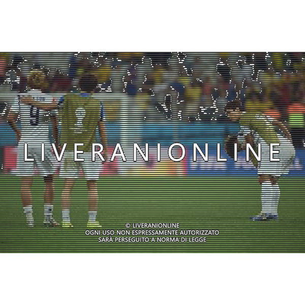 (140626) -- SAO PAULO, June 26, 2014 () -- Korea Republic\'s players react after a Group H match between Korea Republic and Belgium of 2014 FIFA World Cup at the Arena de Sao Paulo Stadium in Sao Paulo, Brazil, on June 26, 2014. Belgium won 1-0 over Korea Republic on Thursday. Belgium and Algeria enter Round of 16 from Group H. (/Li Ga)(pcy) ©PHOTOHOT/Agenzia Aldo Liverani sas - ITALY ONLY - EDITORIAL USE ONLY