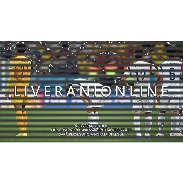 (140626) -- SAO PAULO, June 26, 2014 () -- Korea Republic\'s Kim Young Gwon (2nd L) reacts after a Group H match between Korea Republic and Belgium of 2014 FIFA World Cup at the Arena de Sao Paulo Stadium in Sao Paulo, Brazil, on June 26, 2014. Belgium won 1-0 over Korea Republic on Thursday. Belgium and Algeria enter Round of 16 from Group H. (/Li Ga)(pcy) ©PHOTOHOT/Agenzia Aldo Liverani sas - ITALY ONLY - EDITORIAL USE ONLY