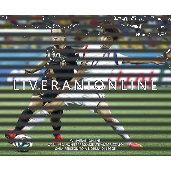 (140626) -- SAO PAULO, June 26, 2014 () -- Belgium\'s Eden Hazard (L) vies with Korea Republic\'s Lee Chung Yong during a Group H match between Korea Republic and Belgium of 2014 FIFA World Cup at the Arena de Sao Paulo Stadium in Sao Paulo, Brazil, on June 26, 2014. Belgium won 1-0 over Korea Republic on Thursday. Belgium and Algeria enter Round of 16 from Group H. (/Chen Jianli)(pcy) ©PHOTOHOT/Agenzia Aldo Liverani sas - ITALY ONLY - EDITORIAL USE ONLY