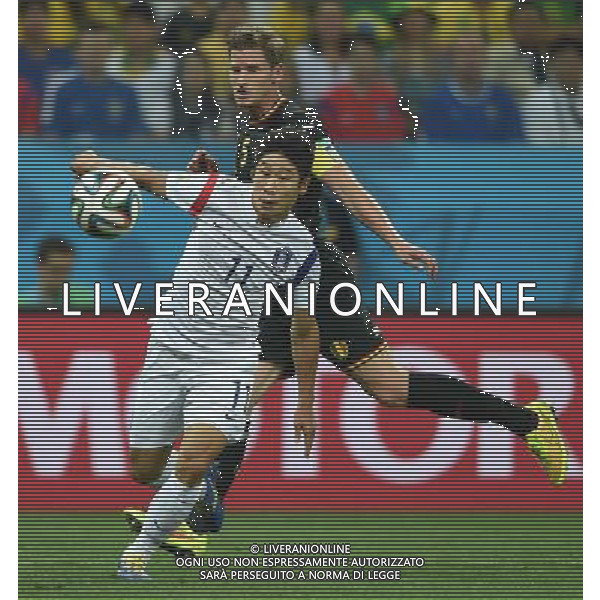 (140626) -- SAO PAULO, June 26, 2014 () -- Belgium\'s Jan Vertonghen (back) vies with Korea Republic\'s Lee Keun Ho during a Group H match between Korea Republic and Belgium of 2014 FIFA World Cup at the Arena de Sao Paulo Stadium in Sao Paulo, Brazil, on June 26, 2014. (/Li Ga)(xzj) ©PHOTOHOT/Agenzia Aldo Liverani sas - ITALY ONLY - EDITORIAL USE ONLY