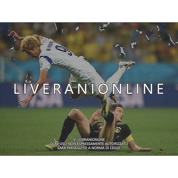 (140626) -- SAO PAULO, June 26, 2014 () -- Korea Republic\'s Son Heung Min (top) competes during a Group H match between Korea Republic and Belgium of 2014 FIFA World Cup at the Arena de Sao Paulo Stadium in Sao Paulo, Brazil, on June 26, 2014. (/Li Ga)(xzj) ©PHOTOHOT/Agenzia Aldo Liverani sas - ITALY ONLY - EDITORIAL USE ONLY