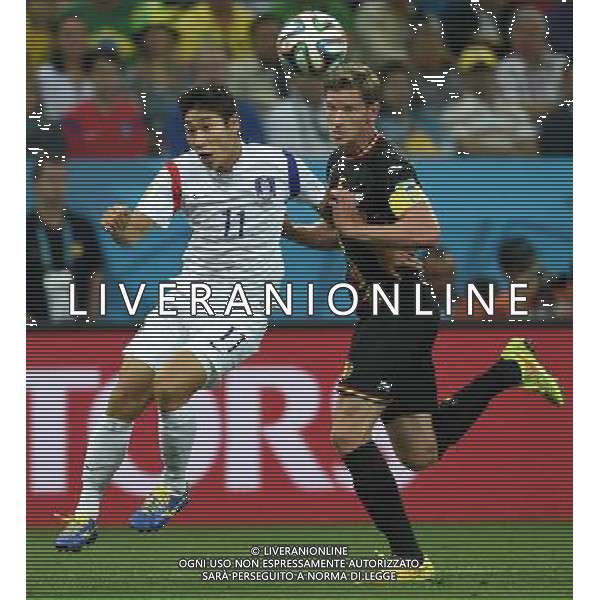 (140626) -- SAO PAULO, June 26, 2014 () -- Korea Republic\'s Lee Keun Ho (L) vies with Belgium\'s Jan Vertonghen during a Group H match between Korea Republic and Belgium of 2014 FIFA World Cup at the Arena de Sao Paulo Stadium in Sao Paulo, Brazil, on June 26, 2014. Belgium won 1-0 over Korea Republic on Thursday. Belgium and Algeria enter Round of 16 from Group H. (/Li Ga)(pcy) ©PHOTOHOT/Agenzia Aldo Liverani sas - ITALY ONLY - EDITORIAL USE ONLY