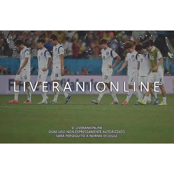 (140626) -- SAO PAULO, June 26, 2014 () -- Korea Republic\'s players leave the field after a Group H match between Korea Republic and Belgium of 2014 FIFA World Cup at the Arena de Sao Paulo Stadium in Sao Paulo, Brazil, on June 26, 2014. Belgium won 1-0 over Korea Republic on Thursday. Belgium and Algeria enter Round of 16 from Group H. (/Li Ga)(pcy) ©PHOTOHOT/Agenzia Aldo Liverani sas - ITALY ONLY - EDITORIAL USE ONLY